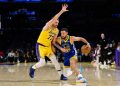 Warriors down Lakers in opener despite Doncic’s near triple-double