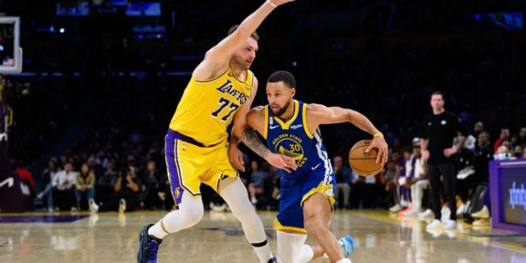 Warriors down Lakers in opener despite Doncic’s near triple-double