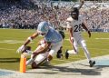 North Carolina falls inches short of overtime upset of Virginia
