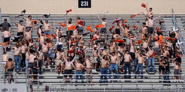 How a bet started a college football trend of shirtless fans