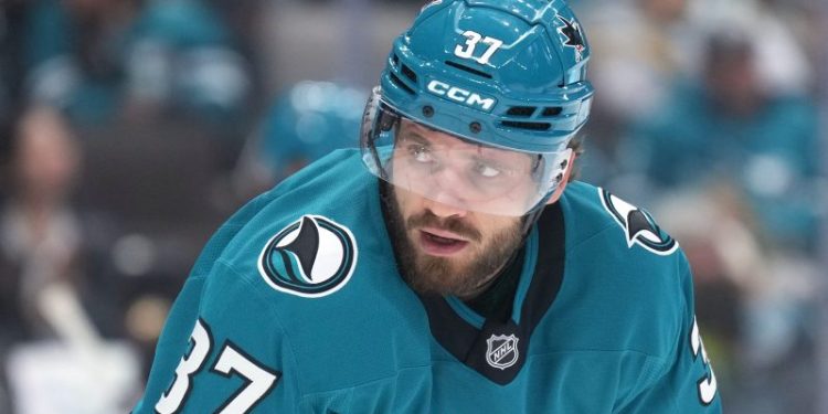 NHL defenseman knocked out of game after being hit by puck on bench