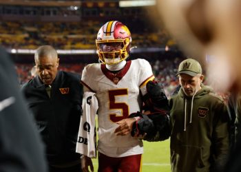 Coach explains why he kept star QB in blowout before he was injured