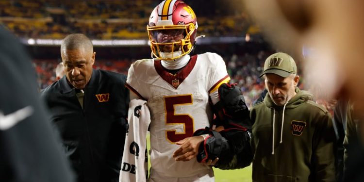 Coach explains why he kept star QB in blowout before he was injured