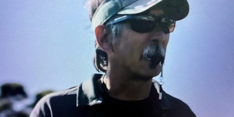 Man charged in killing of ‘Last Chance U’ coach John Beam