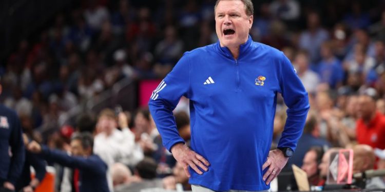 Kansas head coach Bill self hospitalized, did not travel with team