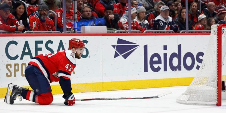 Capitals star, Olympian limps off ice after big hit