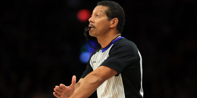 Viral NBA official taken off court in wheelchair after injury