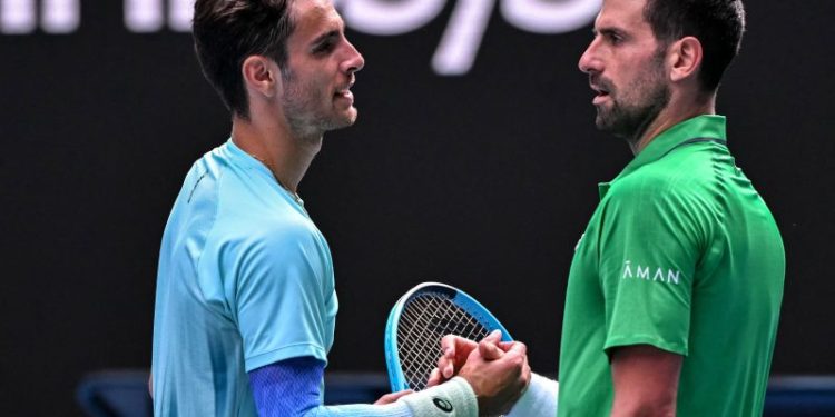 Djokovic reaches Aussie Open semis after injury to opponent