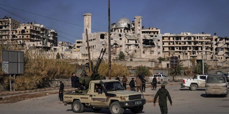 Turkey says Syria using force is an option against US-backed fighters who helped defeat ISIS