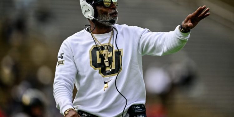 Colorado’s Deion Sanders cites Michigan scandal as reason to avoid risk