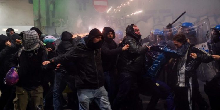 Police use tear gas on protestors near Winter Olympics venues in Milan