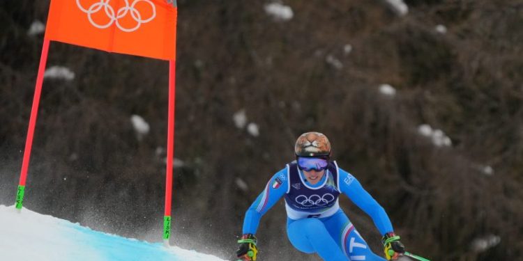 Italian skiing star overcomes injury, thrills fans with super-G gold