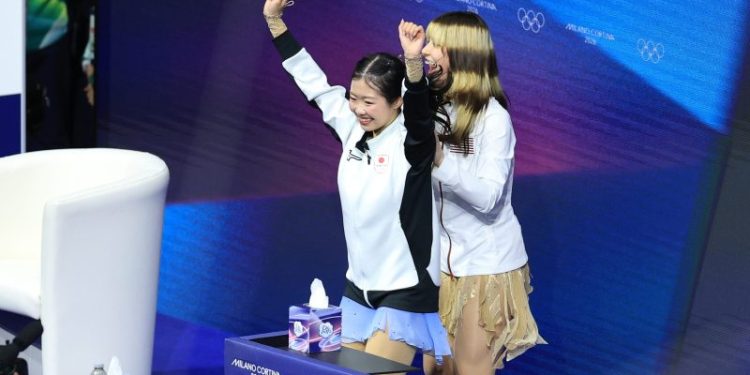 17-year-old Ami Nakai hugs Alysa Liu after both skaters medal at Olympics